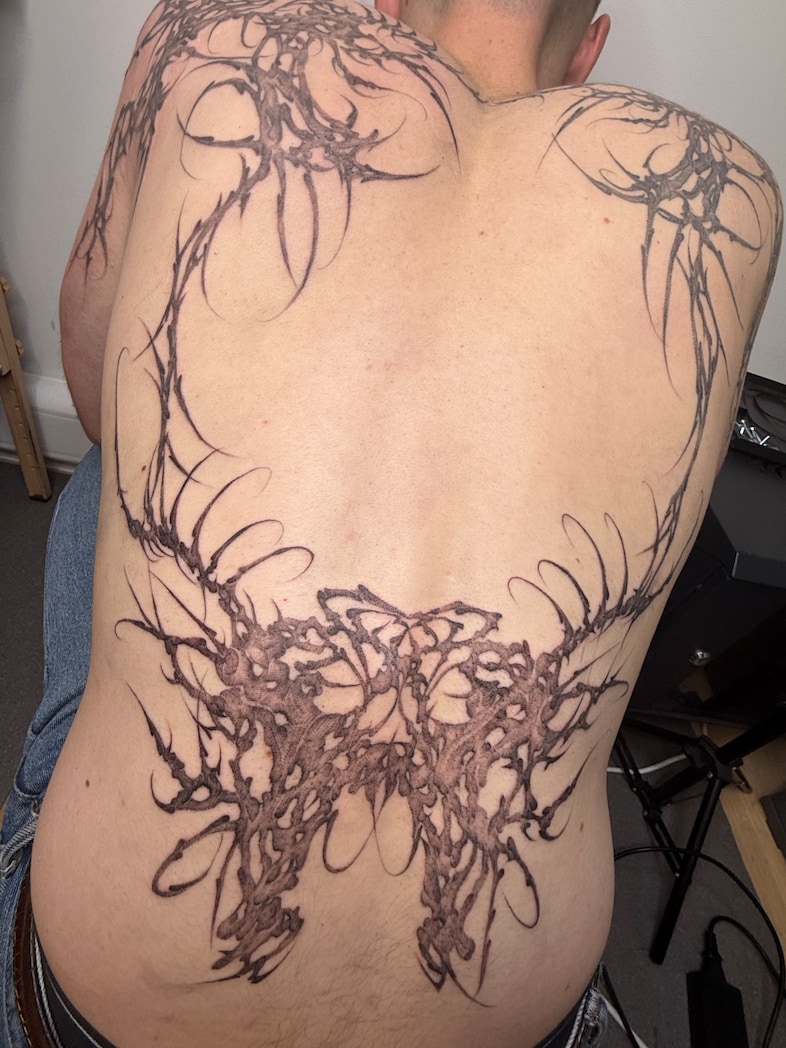 Biomorphic tattoos nature technology