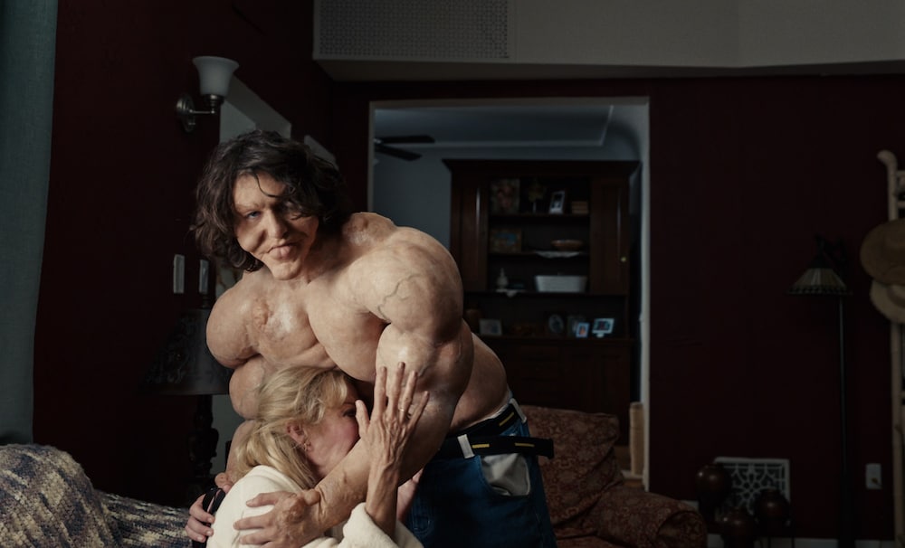 Still from Looksmaxxing showing Niles's prosthetic transformation