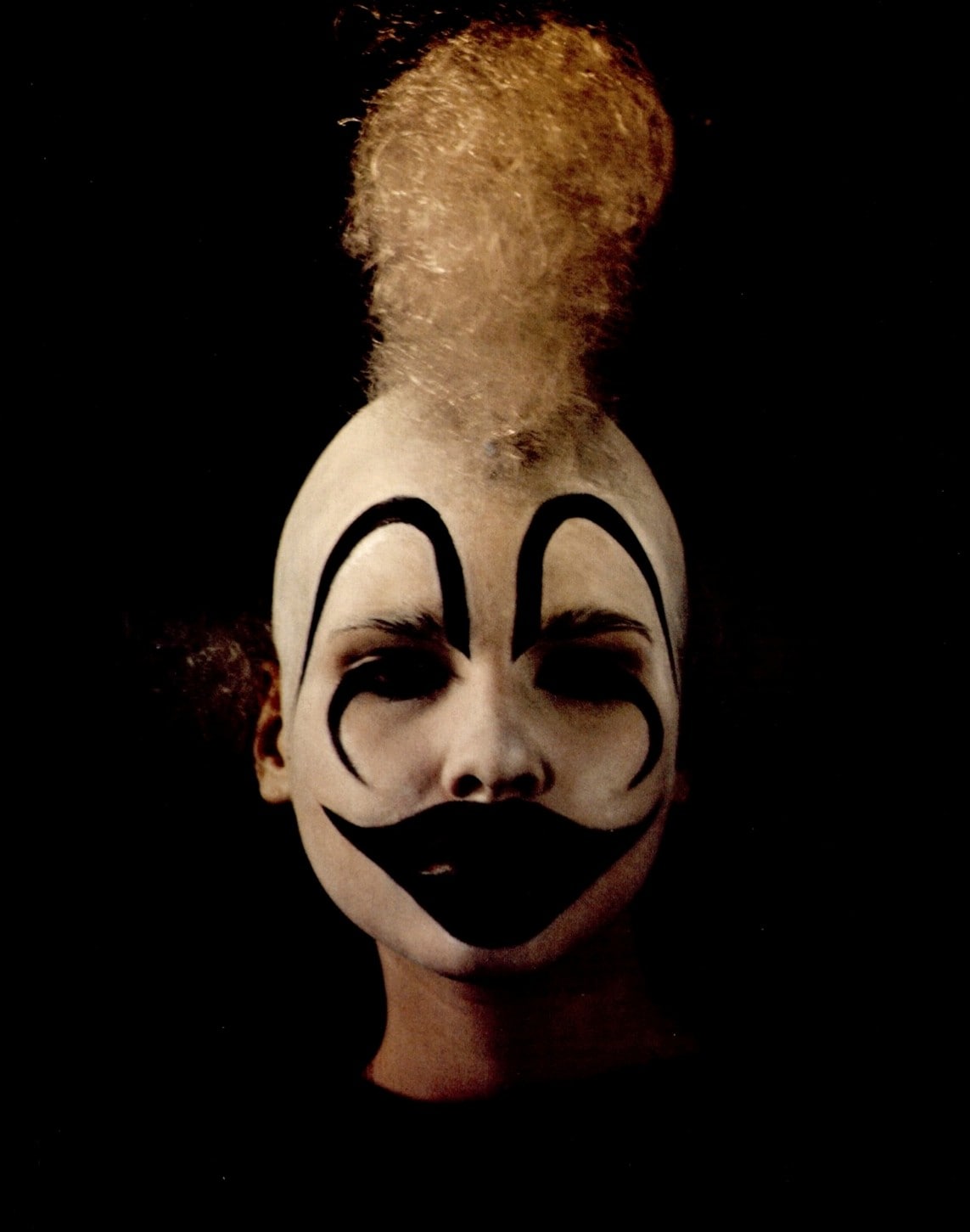 Alexander McQueen's sad clowns backstage for AW01