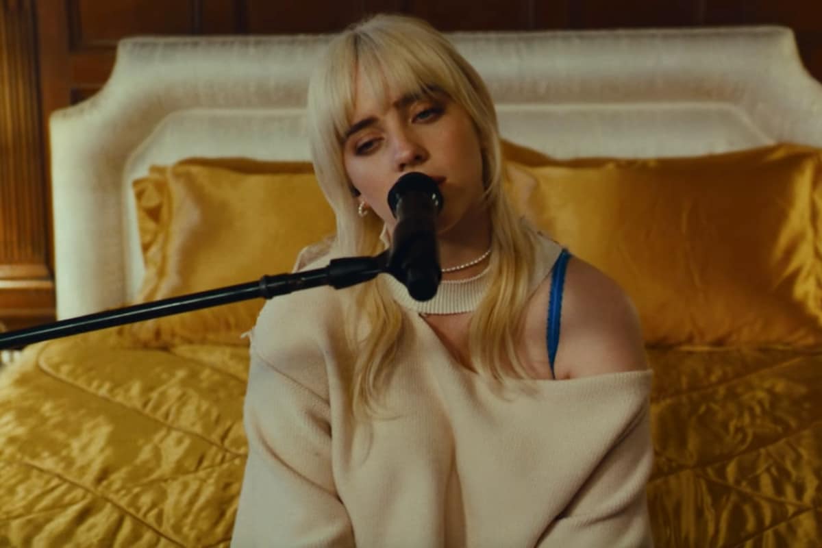Billie Eilish performs a tender rendition of Male Fantasy on a golden bed  | Dazed