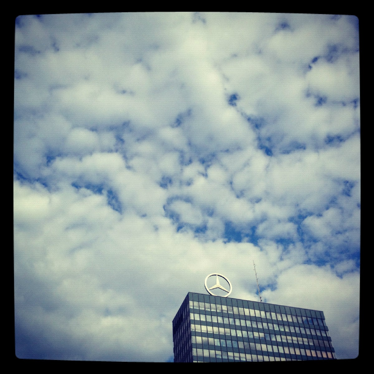 Mercedes-Benz sign. This building was in my favour