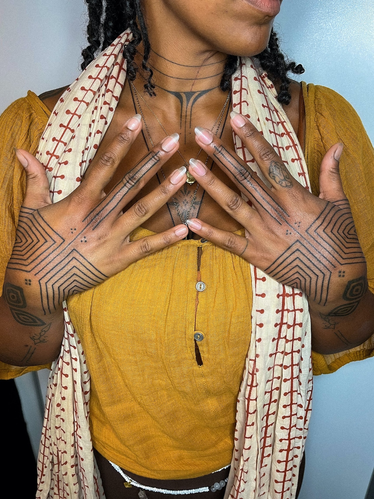 Emmanuel Uchenna Item tattoos