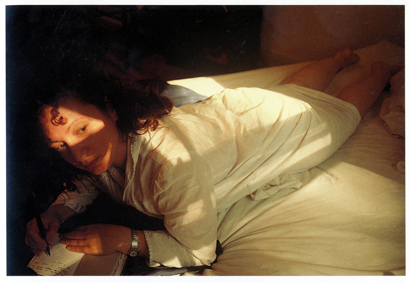 Nan Goldin "Self Portrait writing in my diary", Boston 1989