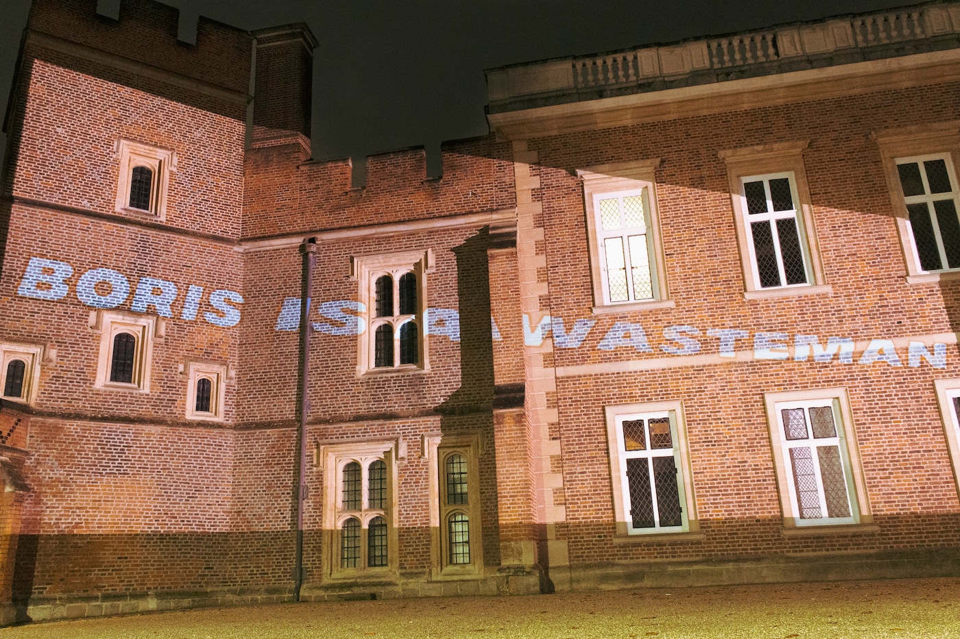 ‘Boris is a wasteman’ projected onto Eton College