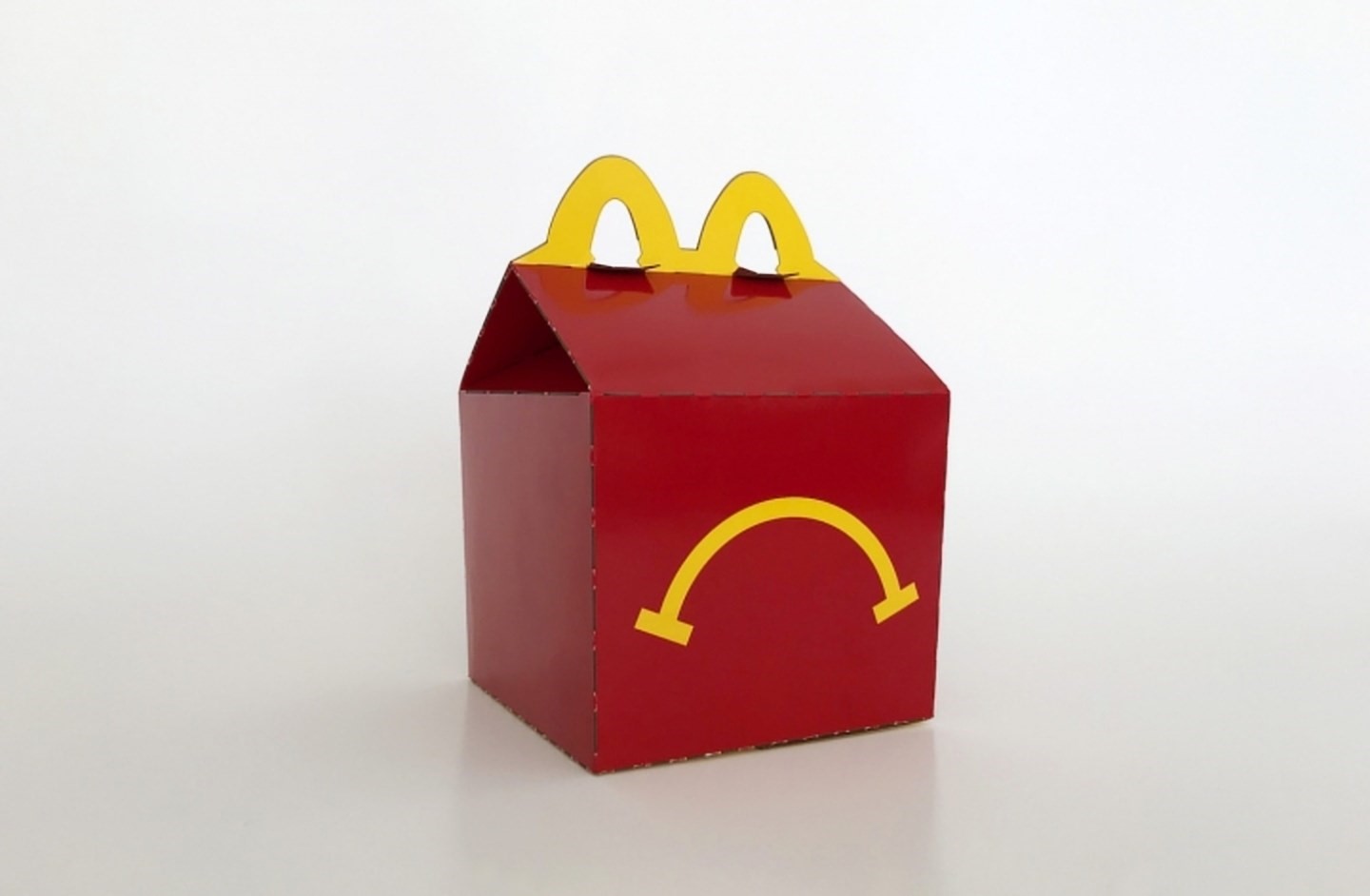 Cleaners throw away an artist's Happy Meal box sculpture