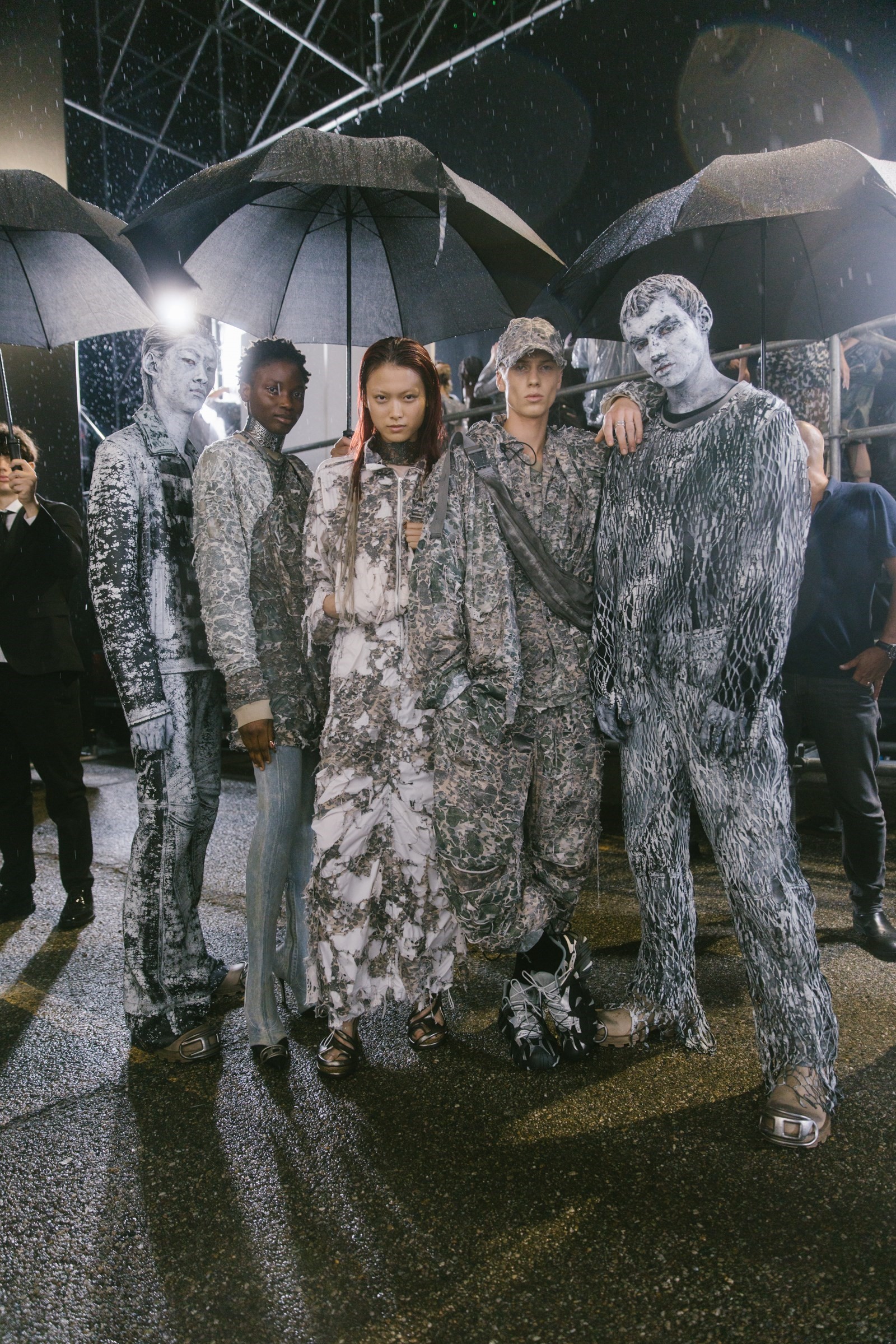 Gigi Hadid's Wearing Clouds in Louis Vuitton Men's Suit + Boots