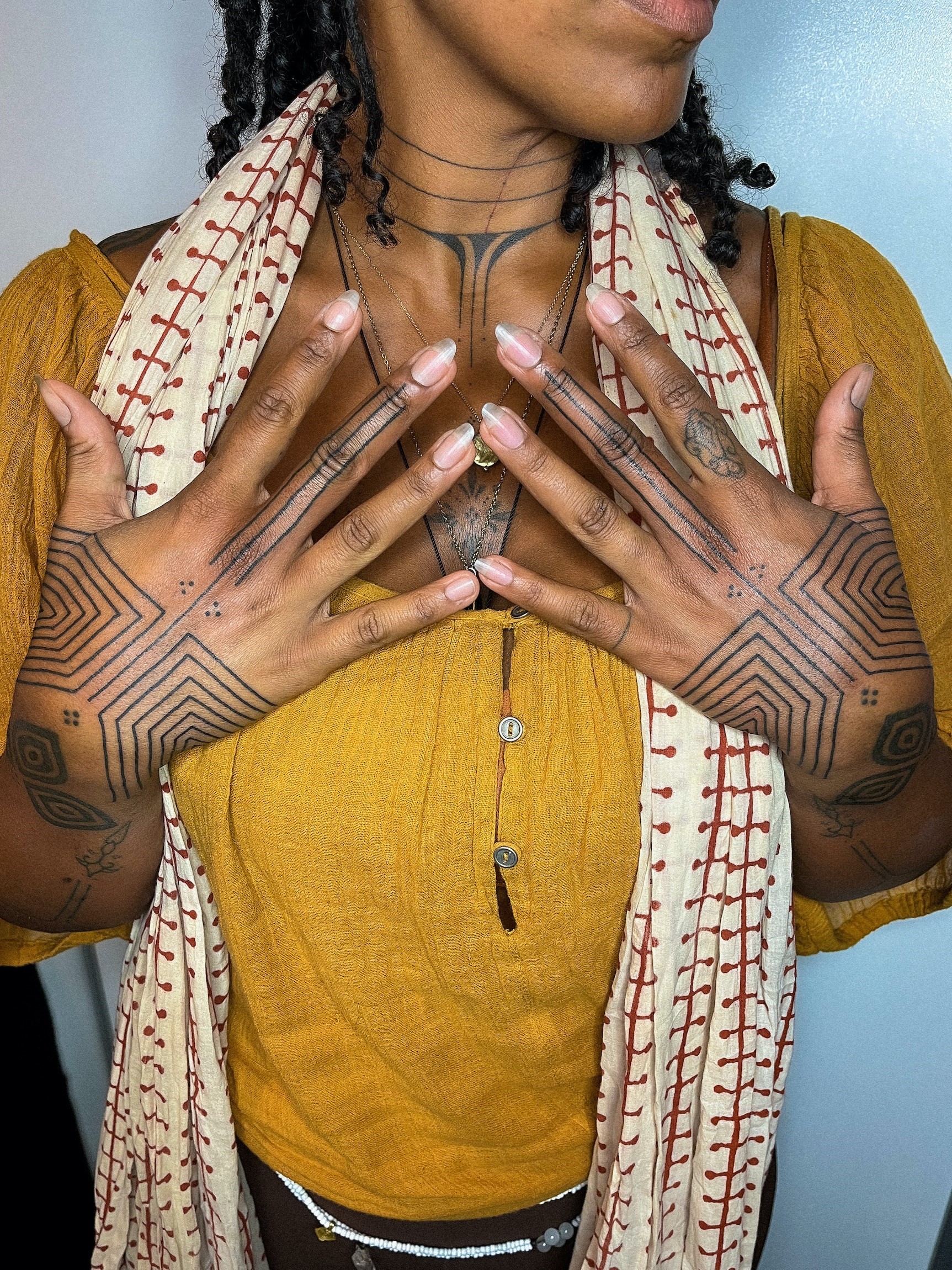 The tattoo artist connecting people with their West African heritage
