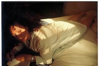 Nan Goldin &quot;Self Portrait writing in my diary&quot;, Boston 1989