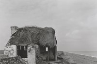 Chris Killip, “Cottage and coastal erosion, Cranstal, Bride” 6