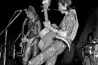 Bowie Mick Rock men in heels