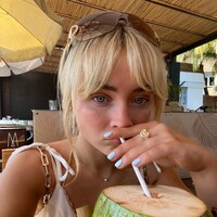 Sabrina Carpenter and her blueberry milk nails capitalism