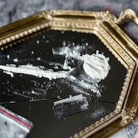 some white powder on a mirror
