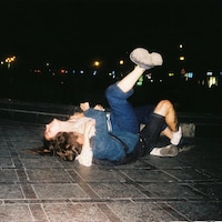 Near the Opera, city centre drinking and walking a