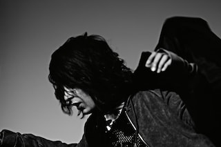 Rory wears cloak from Rokit; hoodie by Cheap Monda