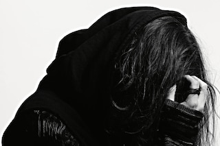 Rory wears hoodie by Haider Ackerman; jumper by Ja