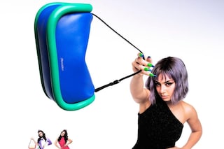 Charli XCX holding the JW Anderson Bumper Bag 