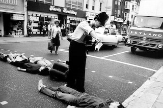 (1) Simon Dack: Activists lie in the road blockin