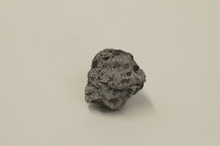 Tar and cement meteorite