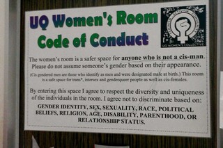 women&#39;s room sign