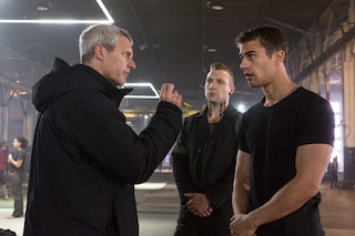 Theo James getting notes from director Neil Burger