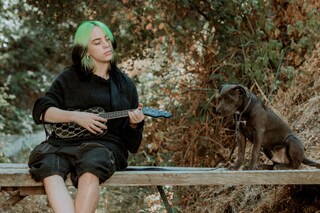 Billie Eilish models Fender ukulele