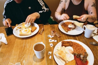RENE MATIC, “TRAVIS AND MIA HAVING BREAKFAST” (2023)
