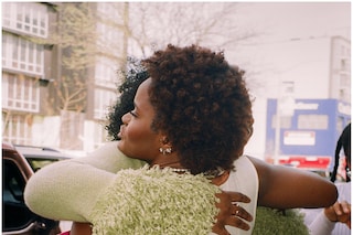 Community greeting with the bible in hand