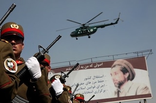 Soldiers from the Afghan National Army march in fr