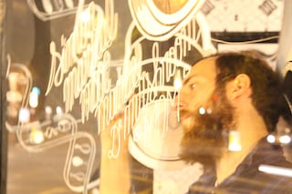 McBess installing his exhibition
