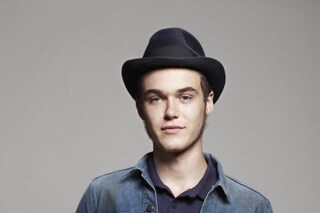 Logan. Denim jacket by Levi's; Polo shirt by Raf S