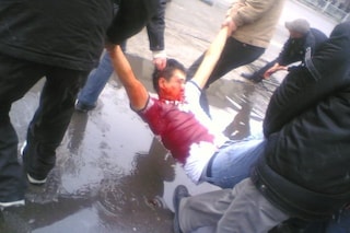 A protester is badly wounded as the police use sni