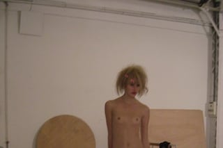 Body and shoes by Alexander McQueen; Hairclips by 