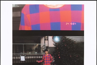 Shohei Yamashita wears top and shorts by Louis Vui