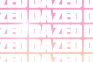 anonymous mask outside Eiffel Tower