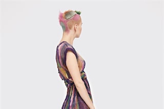 FLORENCE wears dress by CHANEL; shoes by KARL LAGE