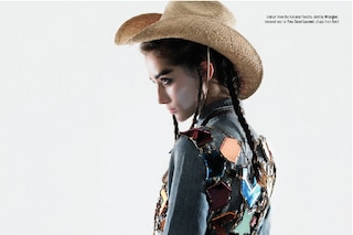 A bronco-bucking cowgirl rides comfortably into th