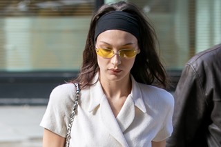 Bella Hadid stretchy black headband sleuth status symbol