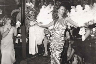 Nan Goldin Naomi modeling beauty parade with fans 1974