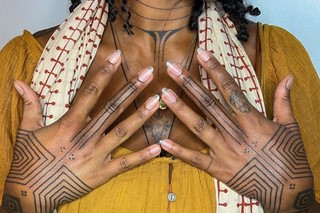 Emmanuel Uchenna Item tattoos