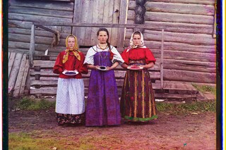 2. P-G peasant girls holding berries