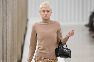 Emma Corrin walking for Miu Miu