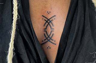 Emmanuel Uchenna Item tattoos
