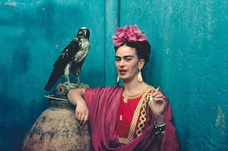 Frida Kahlo and her pet eagle