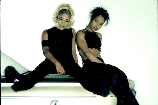 TBoz and Chilli on car