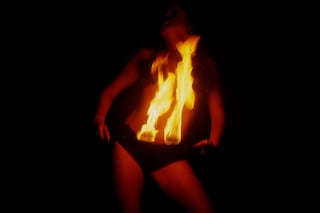 Nan Goldin, “Firedancer, Coney Island, New York” (1999)