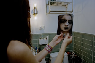 Gracie in mirror face paint 001