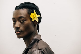 Eckhaus Latta AW22, model with flower in hair