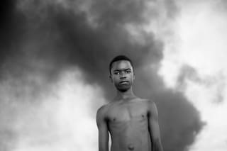 Mário Macilau, &quot;A Boy Standing at the Dump Site&quot; (2015)