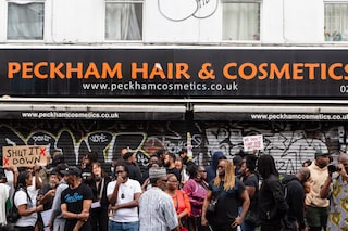 Protesters outside Peckham Hair and Cosmetics