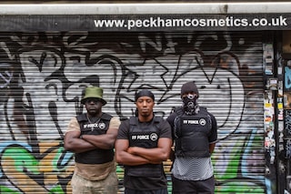 Protesters outside Peckham Hair and Cosmetics